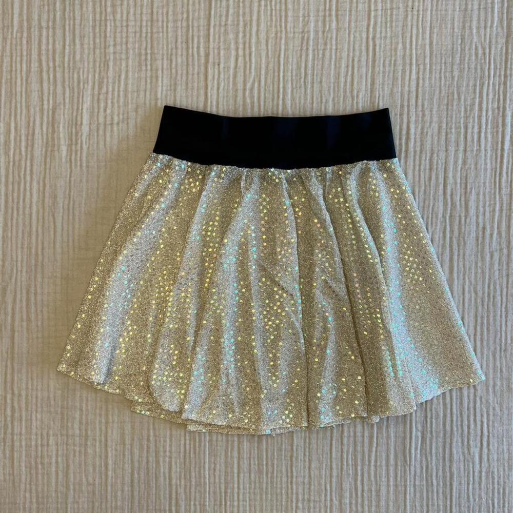 SparkleSkirts gold sequin-like glittery athletic running skirt with black stretc